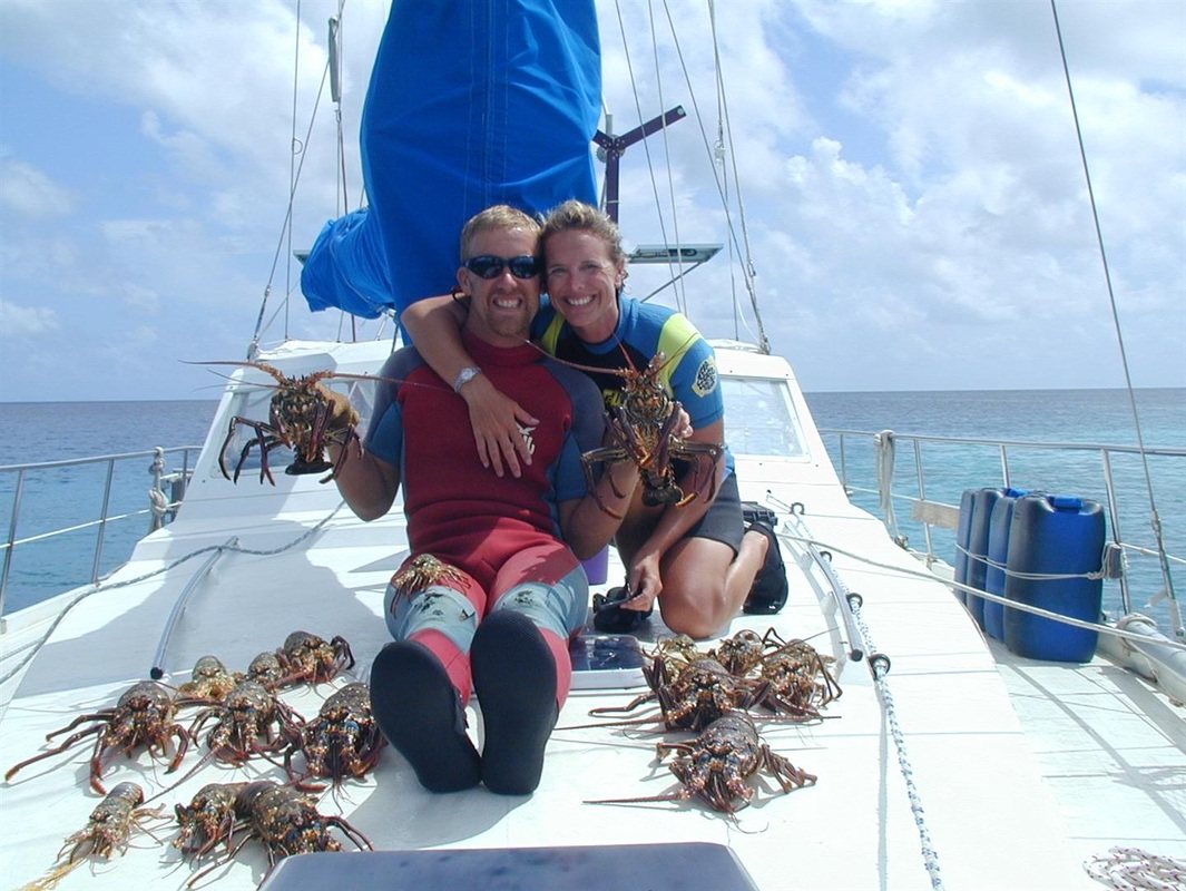 Paul, Kelly and lots of lobsters in Minerva Reef, South Pacific